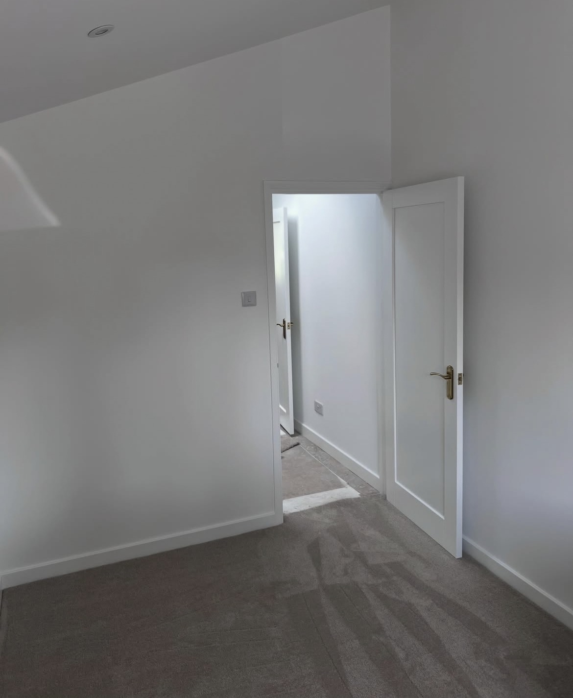 Finished side extension room with new doors, skirting and carpet